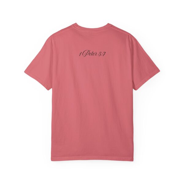 the back of a salmon t-shirt with text on it